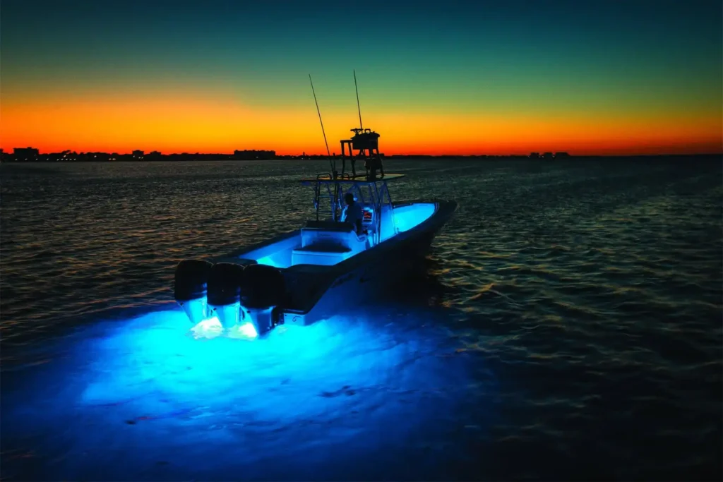 Boat with underwater lights and safe deck lighting for night boating